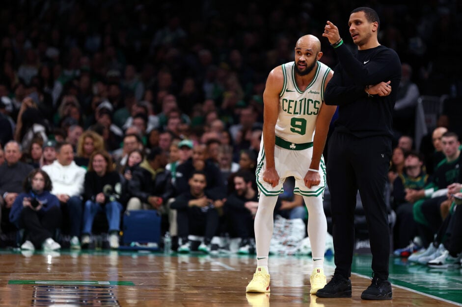 Derrick White talks with Boston Celtics head coach Joe Mazzulla
