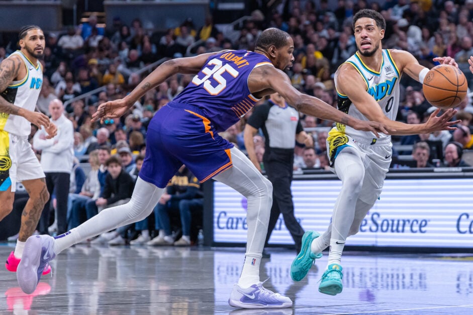 Tyrese Haliburton #0 of the Indiana Pacers drives to the basket against Kevin Durant #35 of the Phoenix Suns during the first half at Gainbridge Fieldhouse on January 4, 2025 in Indianapolis, Indiana.