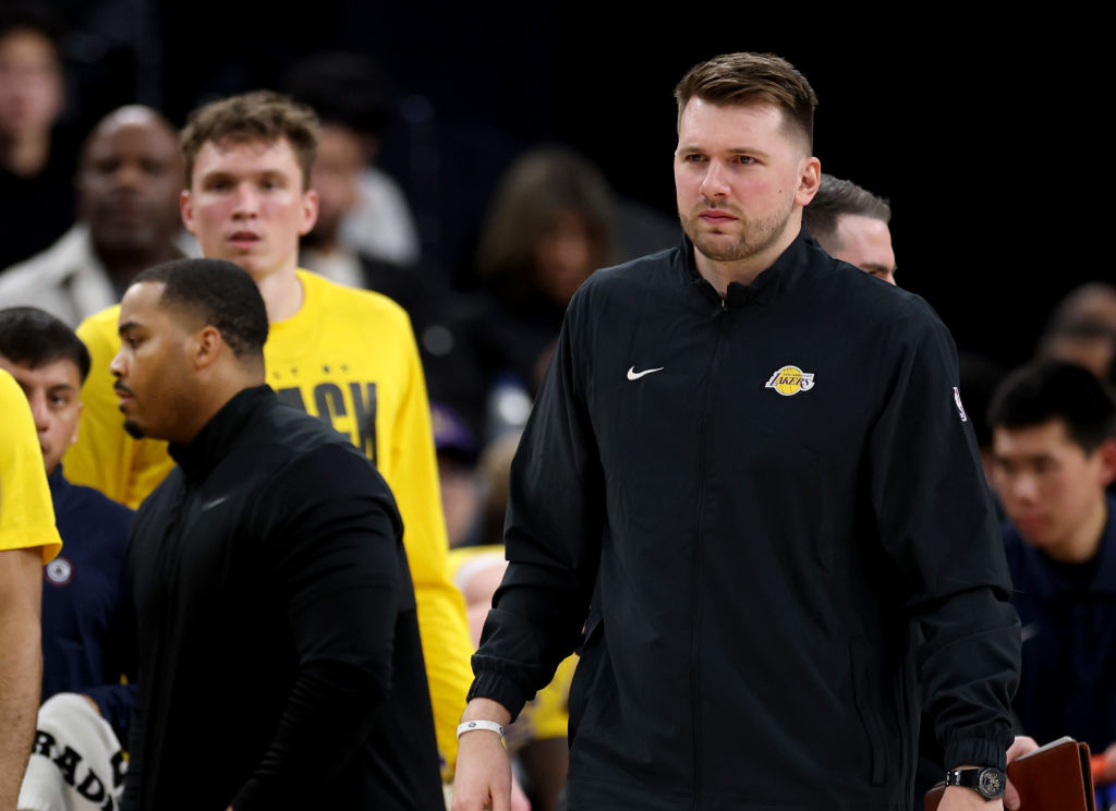 INGLEWOOD, CALIFORNIA - FEBRUARY 04: Luka Doncic #77 of the Los Angeles Lakers on the sidelines during a 122-97 Lakers win over the LA Clippers at Intuit Dome on February 04, 2025 in Inglewood, California. (Photo by Harry How/Getty Images) User expressly acknowledges and agrees that, by downloading and or using this photograph, User is consenting to the terms and conditions of the Getty Images License Agreement. (Photo by Harry How/Getty Images)