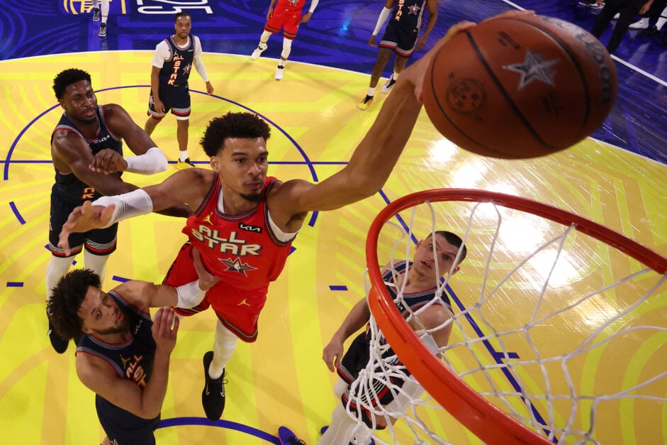 Victor Wembanyama #1 of the San Antonio Spurs dunks the ball in the rising stars All-Star game.