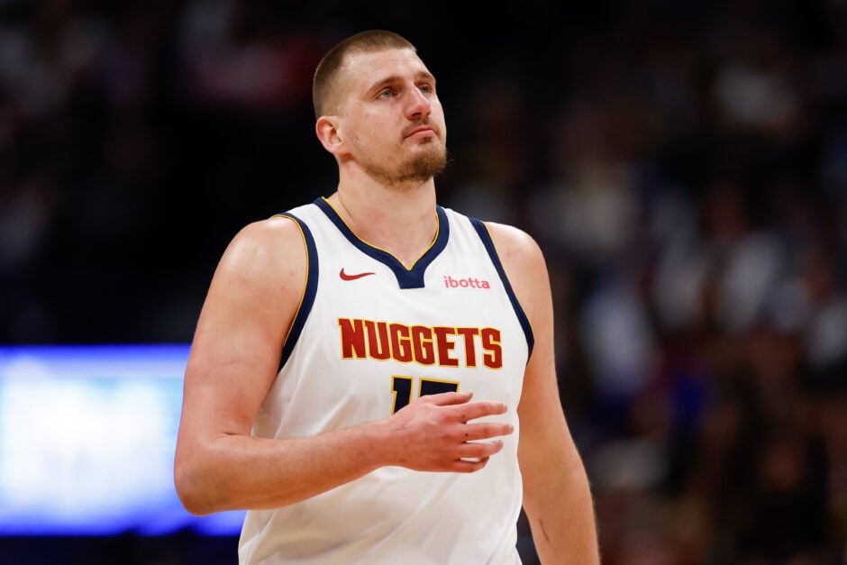 Nikola Jokic #15 of the Denver Nuggets reacts during the third quarter against the Minnesota Timberwolves at Ball Arena.