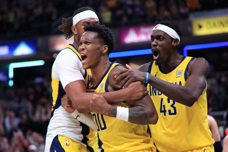 Bennedict Mathurin #00 of the Indiana Pacers reacts with Myles Turner #33 and Pascal Siakam #43 during the second half against the Brooklyn Nets at Gainbridge Fieldhouse on March 20, 2025 in Indianapolis, Indiana.