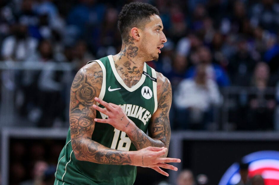 Kyle Kuzma #18 of the Milwaukee Bucks reacts after a 3-pointer during the third quarter of a game against the Detroit Pistons at Little Caesars Arena.