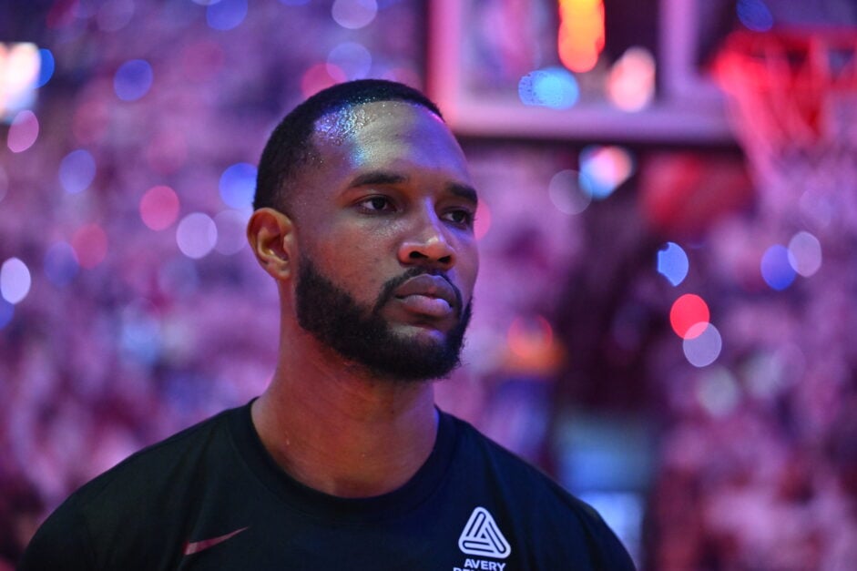 Evan Mobley #4 of the Cleveland Cavaliers listens during the national anthem before game two of the first round of the Eastern Conference Playoffs against the Miami Heat at Rocket Arena on April 23, 2025 in Cleveland, Ohio.