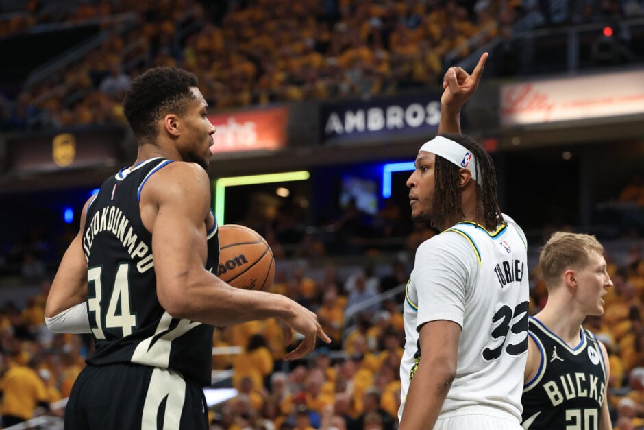 Myles Turner #33 of the Indiana Pacers reacts in front of Giannis Antetokounmpo #34 of the Milwaukee Bucks during the fourth quarter of Game 5 of the 2025 NBA Playoffs at Gainbridge Fieldhouse on April 29, 2025 in Indianapolis, Indiana.