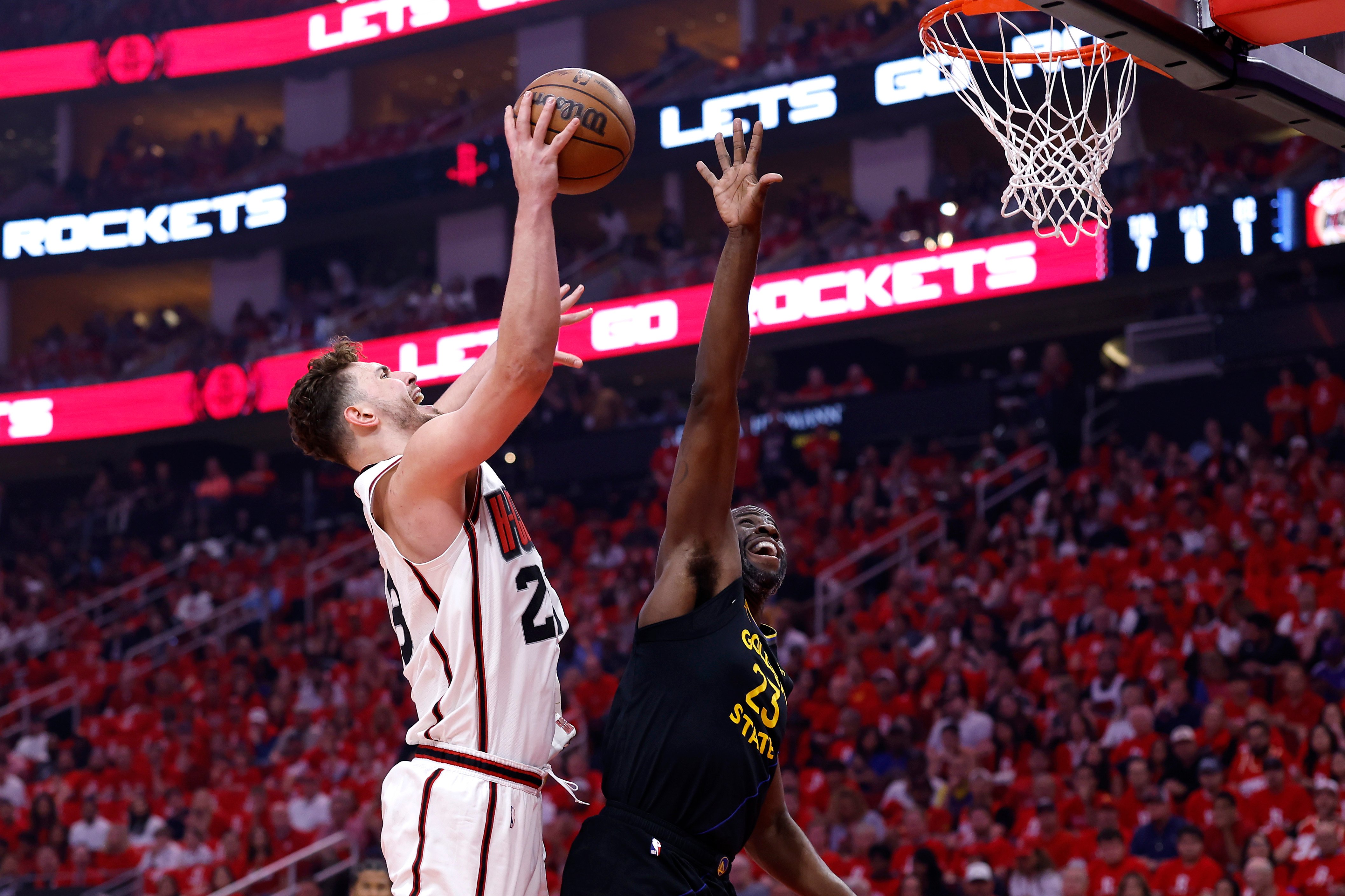 Alperen Sengun and Draymond Green during the Golden State Warriors v Houston Rockets - Game Seven