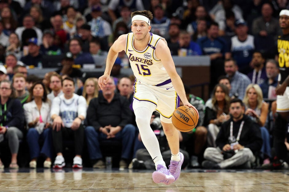 Austin Reaves #15 of the Los Angeles Lakers dribbles the ball against the Minnesota Timberwolves in the third quarter of Game Four of the First Round of the 2025 NBA Playoffs at Target Center on April 27, 2025 in Minneapolis, Minnesota.