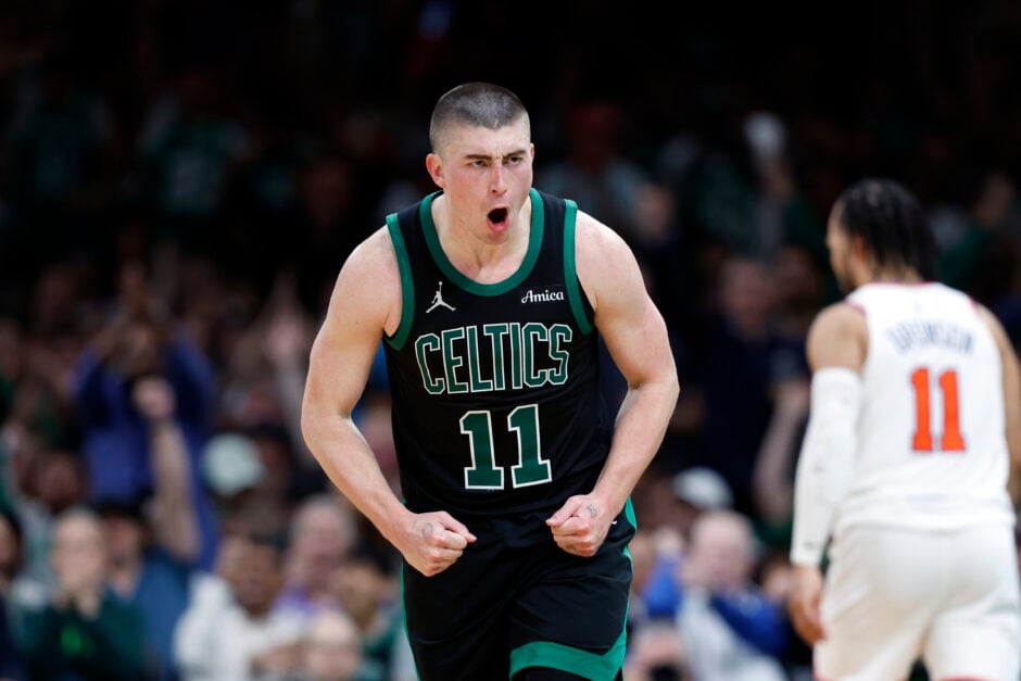 Boston Celtics guard Payton Pritchard (11) celebrates during the fourth quarter in game five of the NBA Eastern Conference semifinal against the New York Knicks at TD Garden.