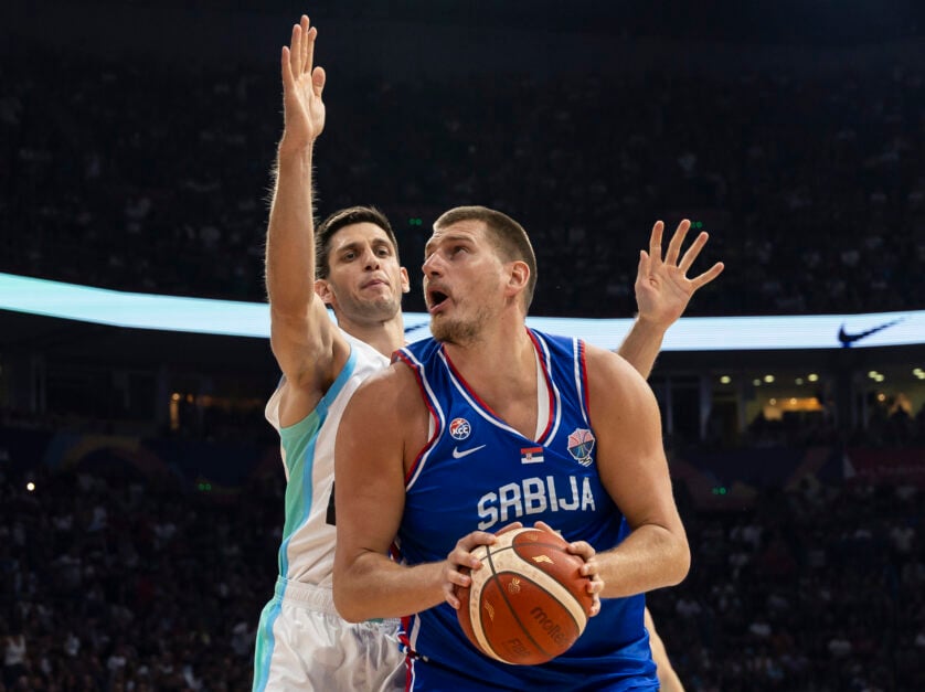 Nikola Jokic (R) of Serbia in action against Martin Krampelj (L) of Slovenia during the International Basketball Friendly match between Serbia and Slovenia at Belgrade Arena