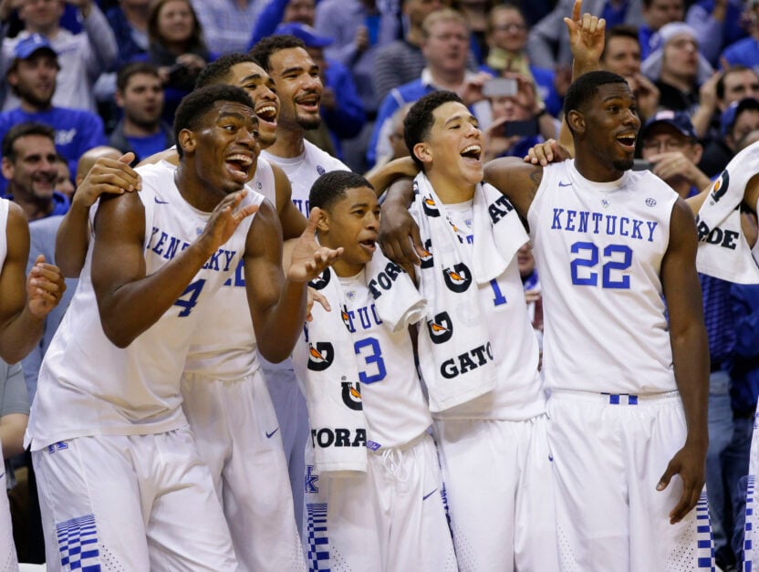 From left, Kentucky's Dakari Johnson, Karl-Anthony Towns, Willie Cauley-Stein, Tyler Ulis, Devin Booker, and Alex Poythress enjoy the final minutes of a 72-40 win against Kansas on Tuesday, Nov. 18, 2014, at Bankers Life Fieldhouse in Indianapolis.