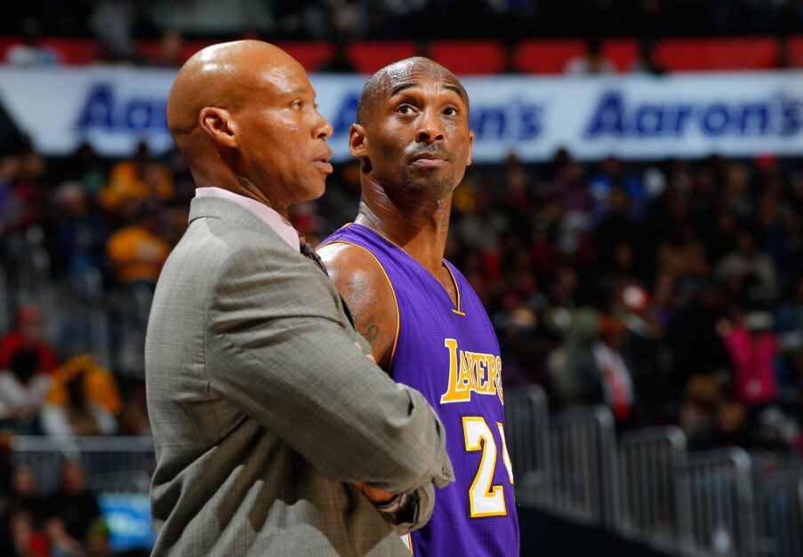 Kobe Bryant #24 of the Los Angeles Lakers converses with Byron Scott during the game against the Atlanta Hawks at Philips Arena.