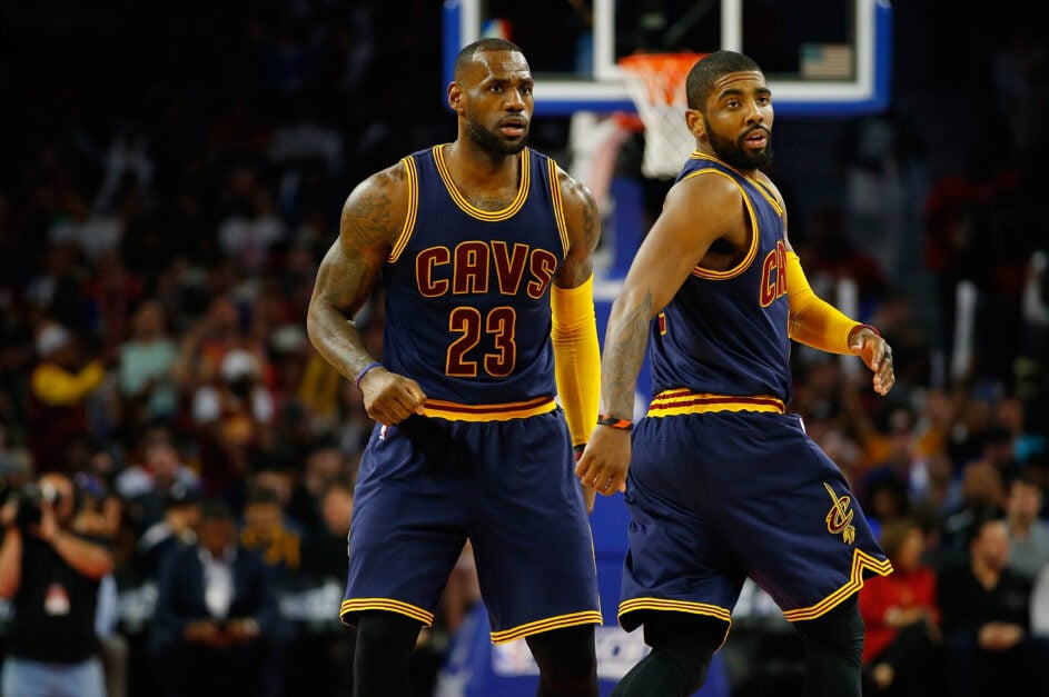 Kyrie Irving #2 of the Cleveland Cavaliers celebrates a fourth quarter basket with LeBron James #23 in game four of the NBA Eastern Conference quarterfinals during the 2016 NBA Playoffs at the Palace of Auburn Hills on April 24, 2016 in Auburn Hills, Michigan.