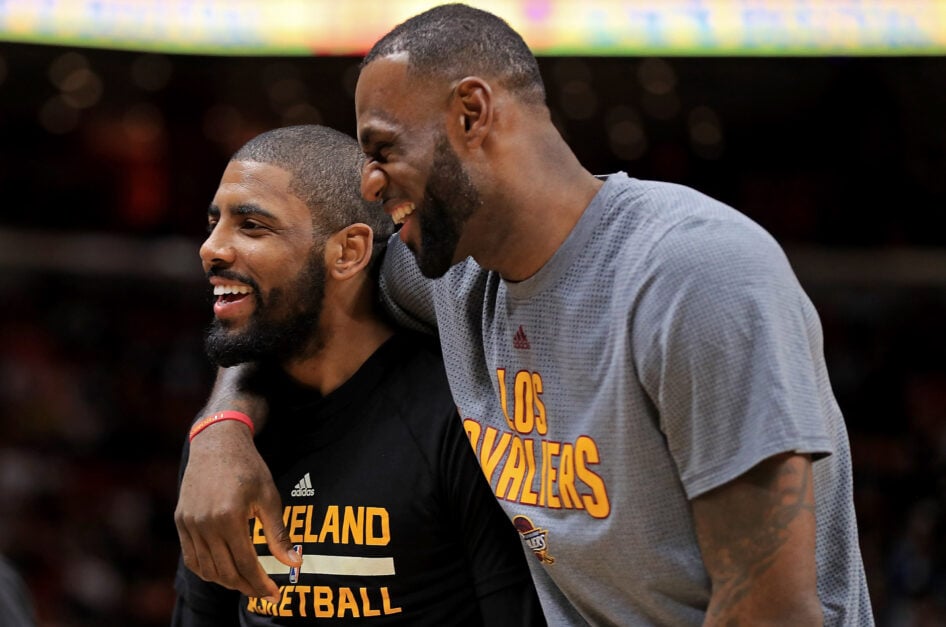 Kyrie Irving #2 and LeBron James #23 of the Cleveland Cavaliers laugh during a game against the Miami Heat at American Airlines Arena on March 4, 2017
