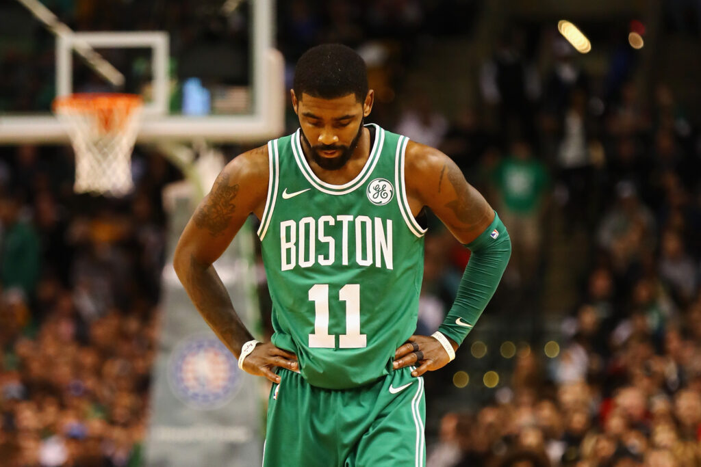 Kyrie Irving #11 of the Boston Celtics with hands on hips
