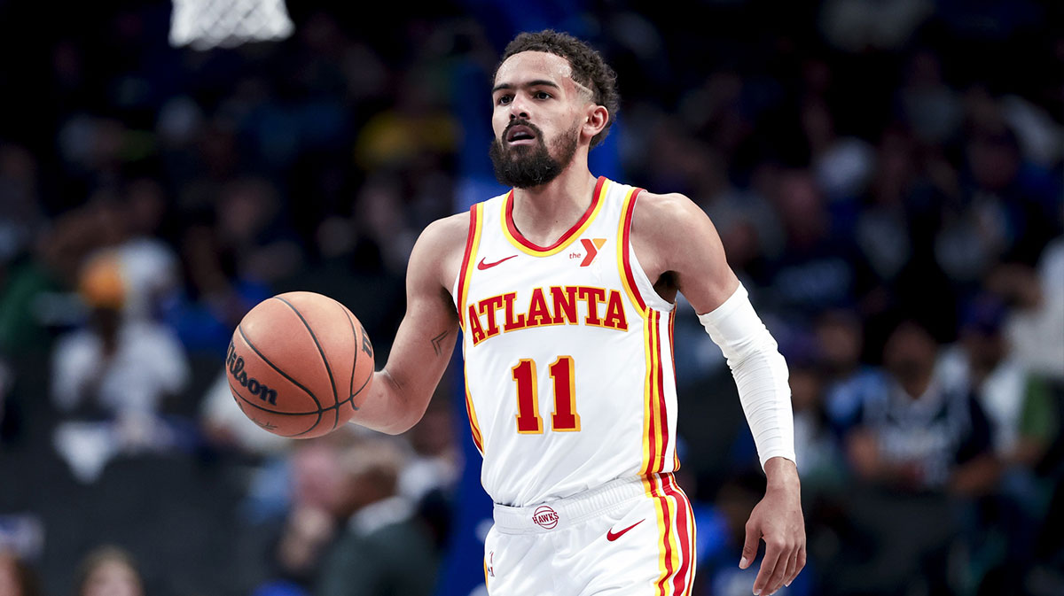 Atlanta Hawks guard Trae Young (11) dribbles against the Dallas Mavericks during the second half at American Airlines Center.