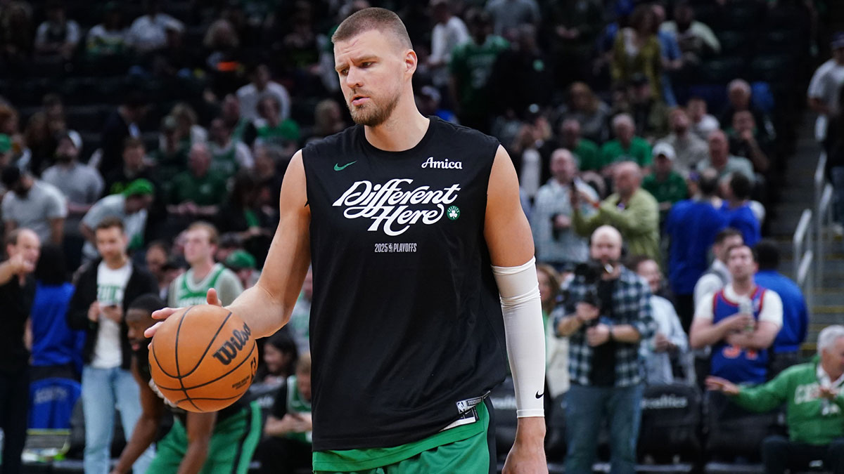 Celtics center Kristaps Porzingis (8) warms up before the start of game two of the second round for the 2025 NBA Playoffs against the New York Knicks at TD Garden