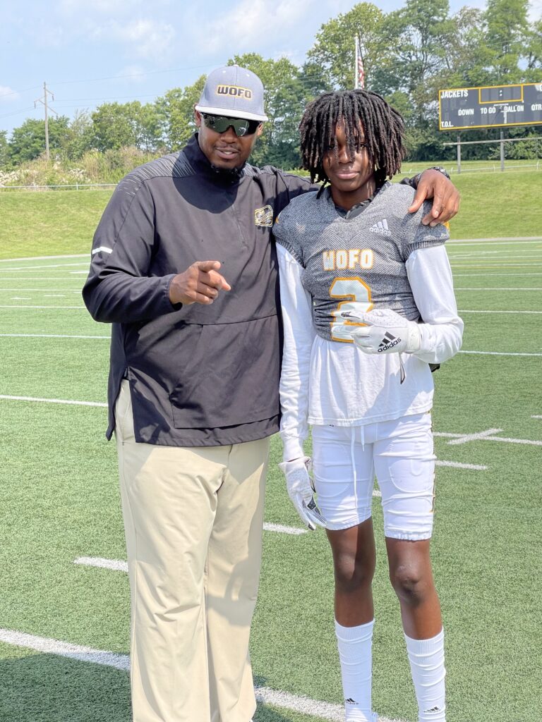 Dennis and Jasper Johnson during Jasper's last season of football (Courtesy of the Johnson Family)