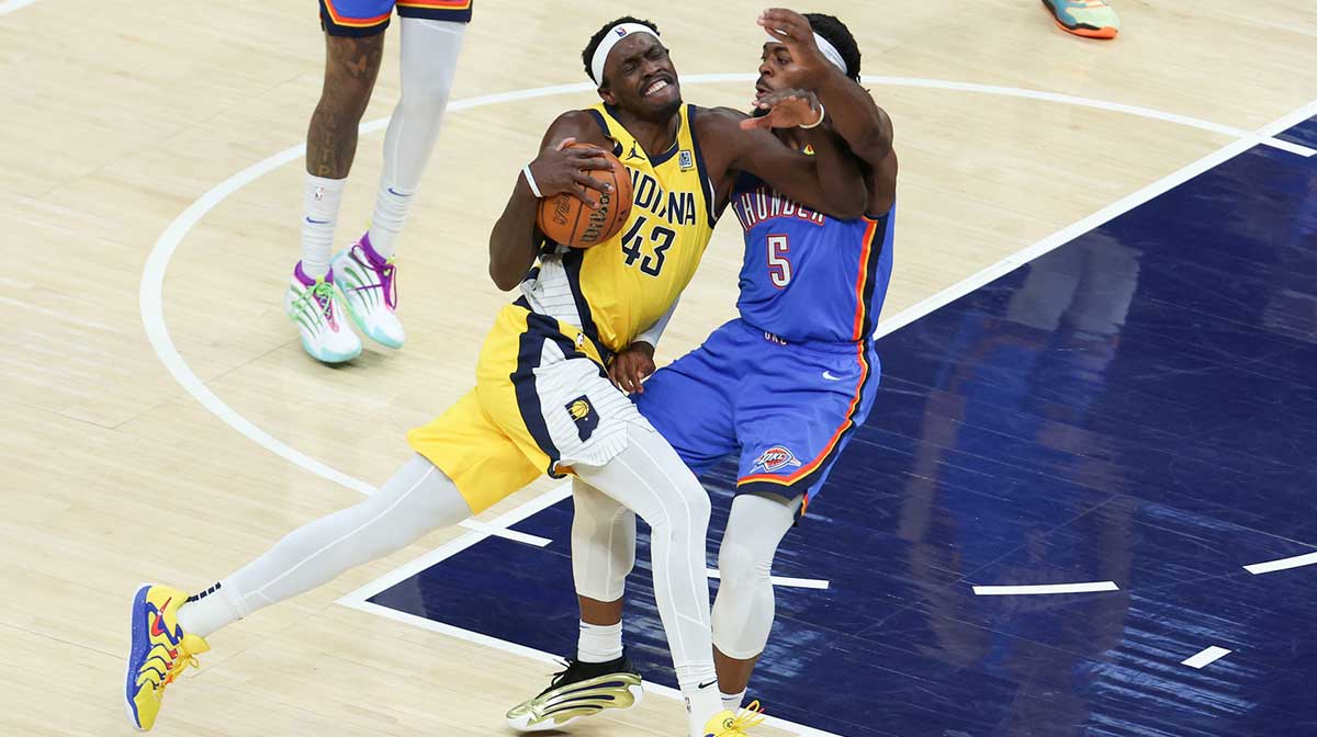 Indiana Pacers forward Pascal Siakam (43) drives to the basket defended by Oklahoma City Thunder guard Luguentz Dort (5) in the first quarter during game six of the 2025 NBA Finals at Gainbridge Fieldhouse.