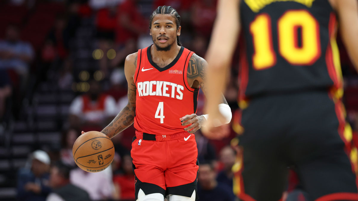Houston Rockets guard Jalen Green (4) brings the ball up the court during the first quarter against the Atlanta Hawks at Toyota Center. 