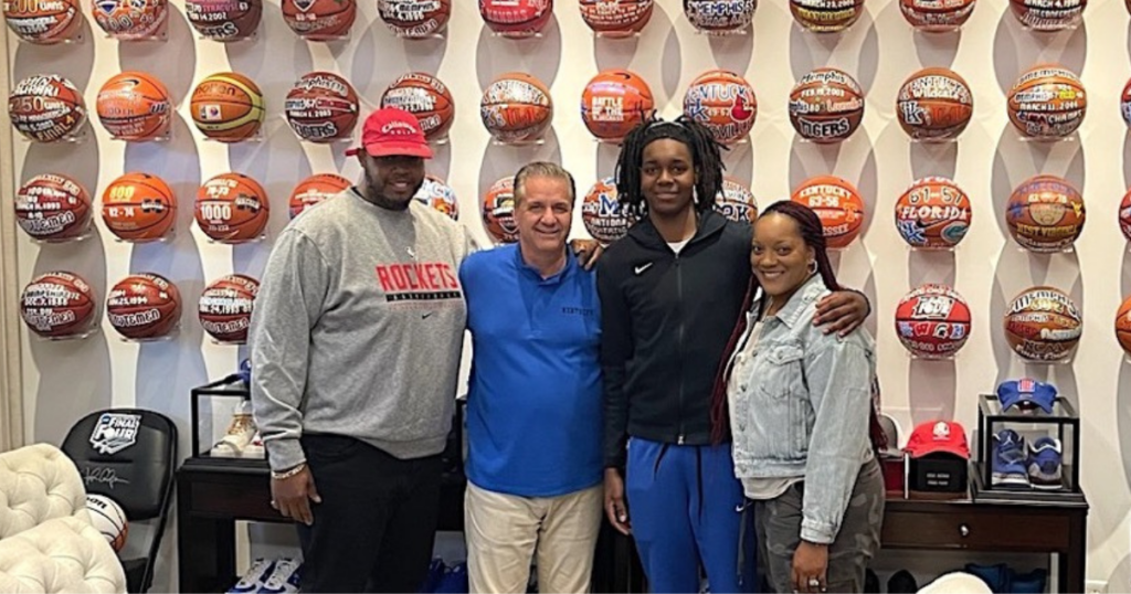 Jasper Johnson and his parents with John Calipari when he received his scholarship offer