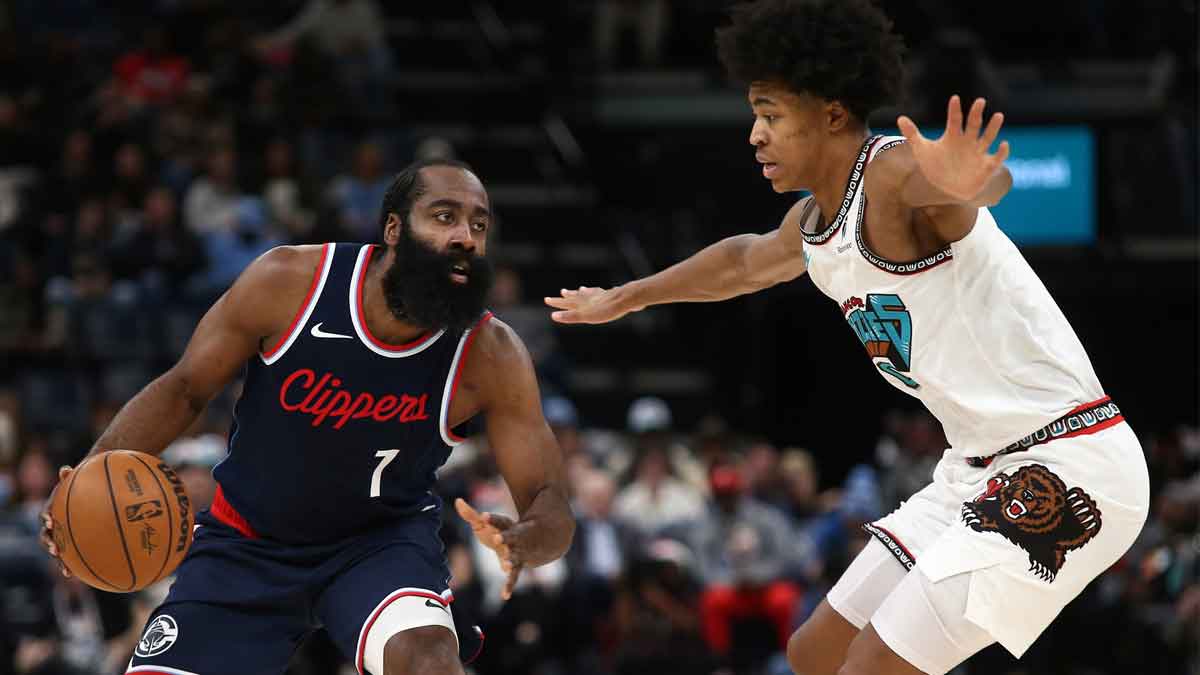 Los Angeles Clippers guard James Harden (1) dribbles as Memphis Grizzlies forward Jaylen Wells (0) defends during the third quarter at FedExForum.