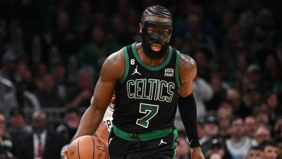 Boston Celtics guard Jaylen Brown (7) dribbles the ball against the San Antonio Spurs during the third quarter at the TD Garden.(USA TODAY Sports)