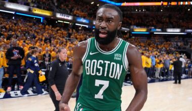 Boston Celtics guard Jaylen Brown (7) celebrates after Game 4 of the NBA Eastern Conference basketball finals against the Indiana Pacers, Monday, May 27, 2024, in Indianapolis. The Celtics won 105-102.(AP Photo/Michael Conroy)