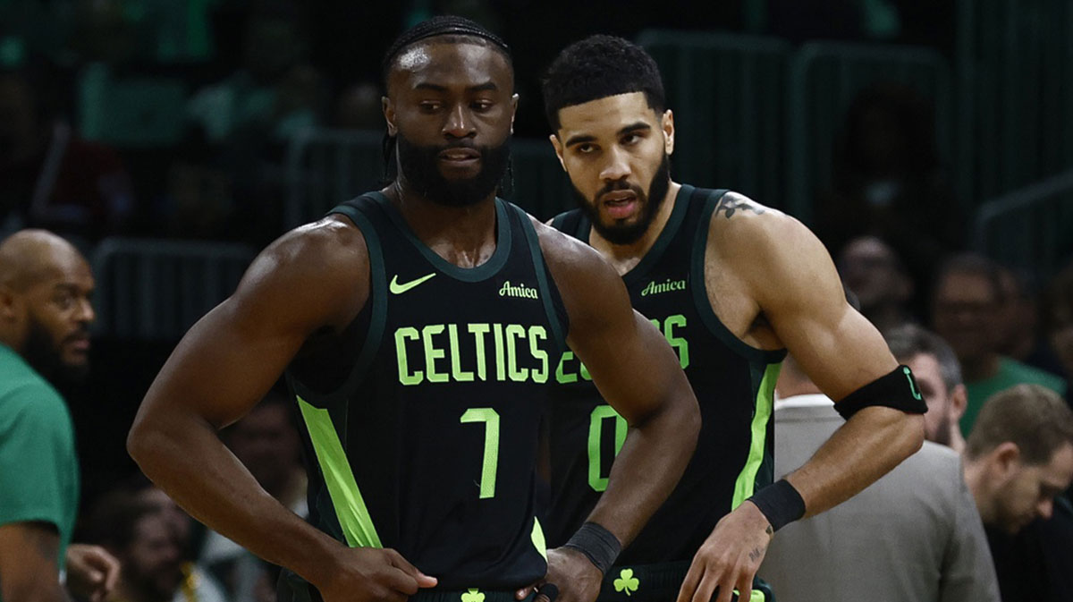 Boston Celtics guard Jaylen Brown (7) and forward Jayson Tatum (0) stand on the court during a timeout during the second half of their loss to the Cleveland Cavaliers at TD Garden.
