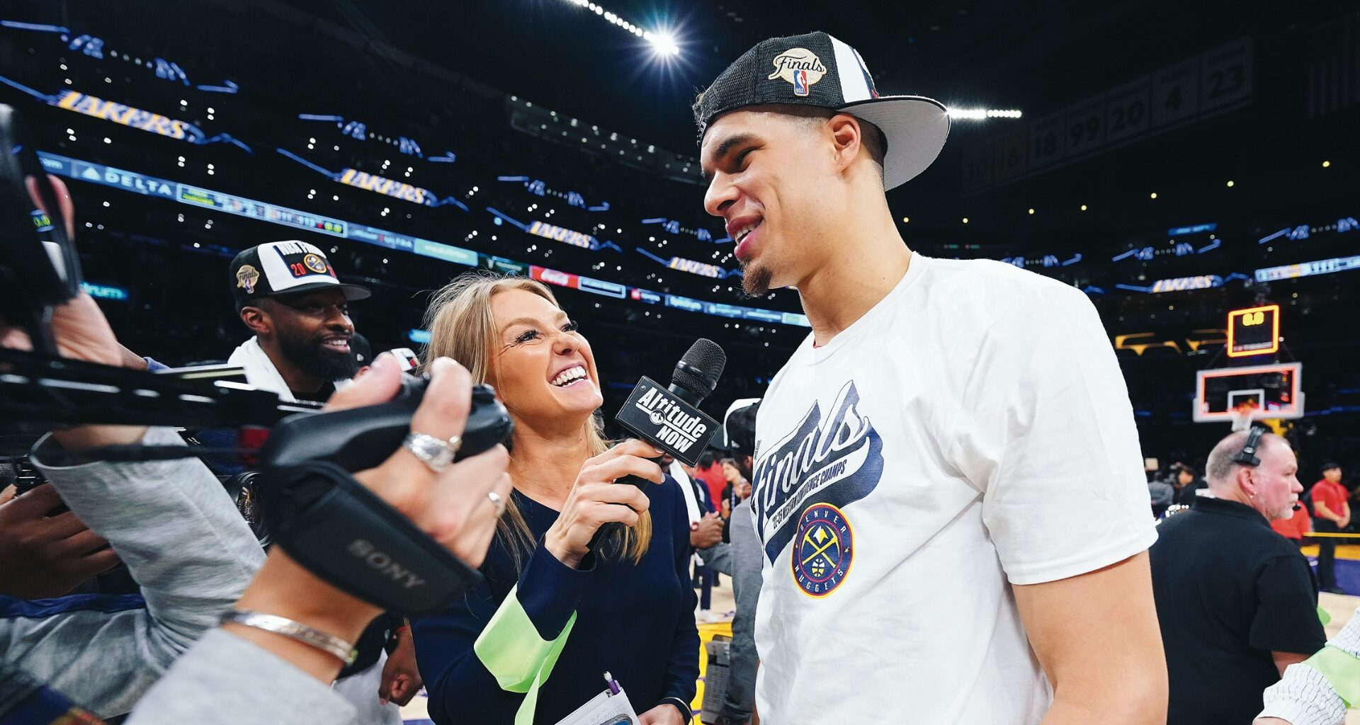 Katy Winge scores award, fans in roles with Denver Nuggets