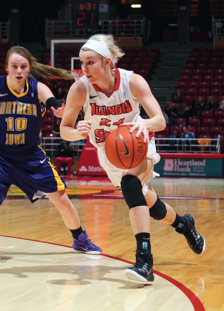 Katy Winge ’15 drives around an opposing player during her playing days at Illinois State. 