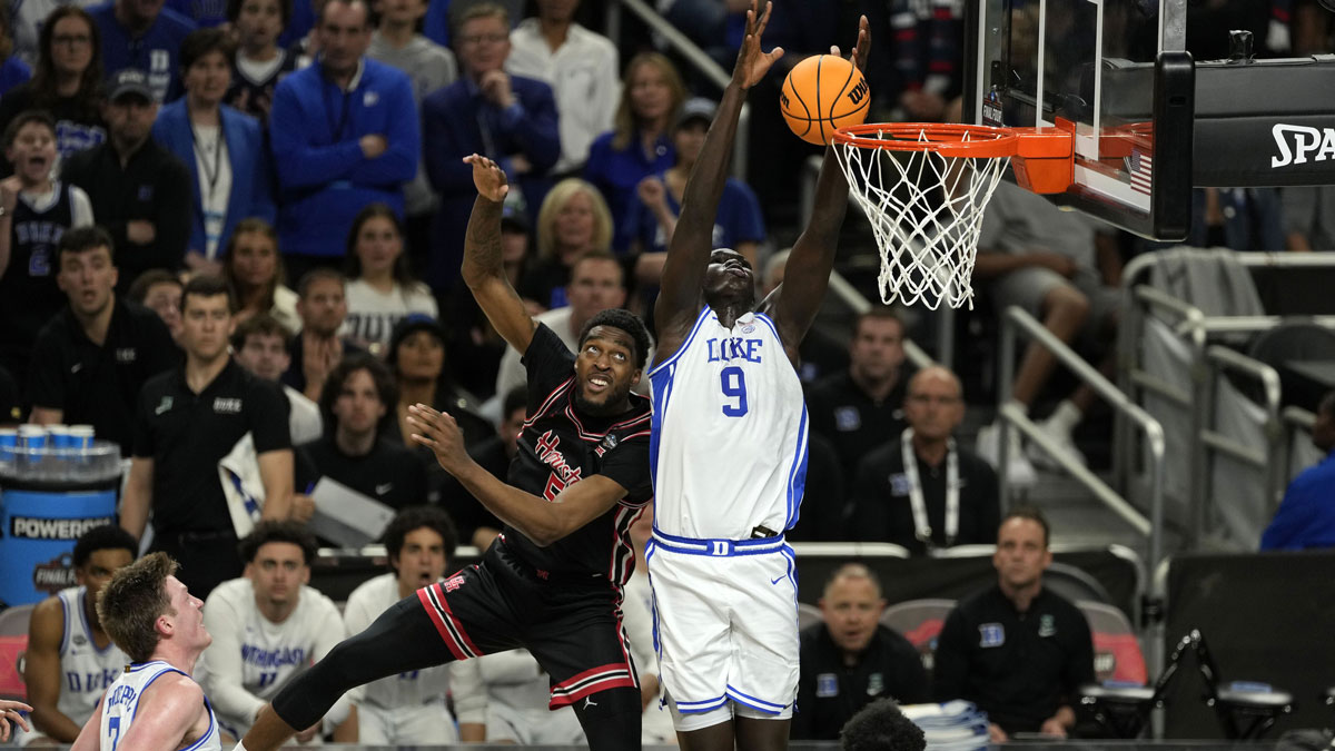 Duke Blue Devils center Khaman Maluach (9) shoots the ball over Houston Cougars forward Ja'Vier Francis (5) during the second half in the semifinals of the men's Final Four of the 2025 NCAA Tournament at Alamodome.