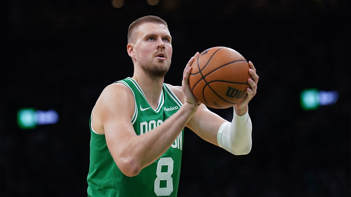 Boston Celtics center Kristaps Porzingis (8) shoots a free throw against the New York Knicks in the second half during game two of the second round for the 2025 NBA Playoffs at TD Garden.