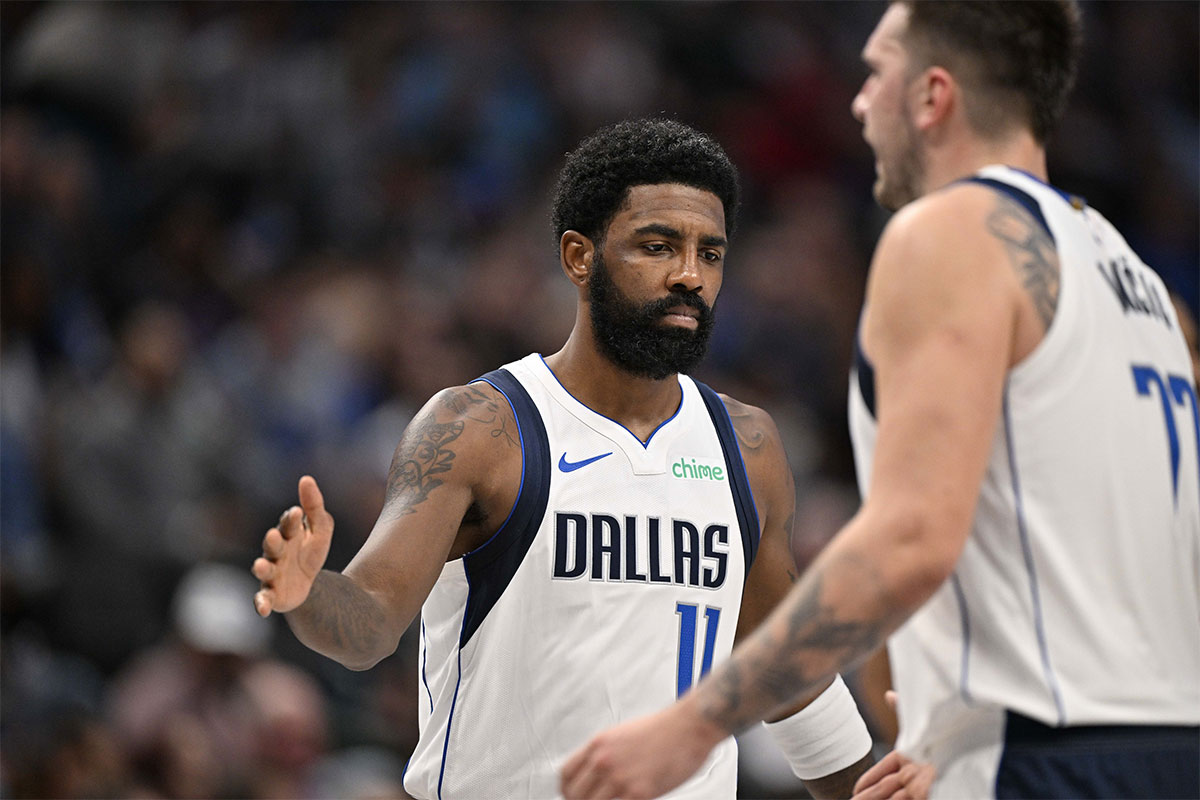 Dallas Mavericks guard Kyrie Irving (11) comes into the game to replace guard Luka Doncic (77) during the second half against the Orlando Magic at the American Airlines Center.