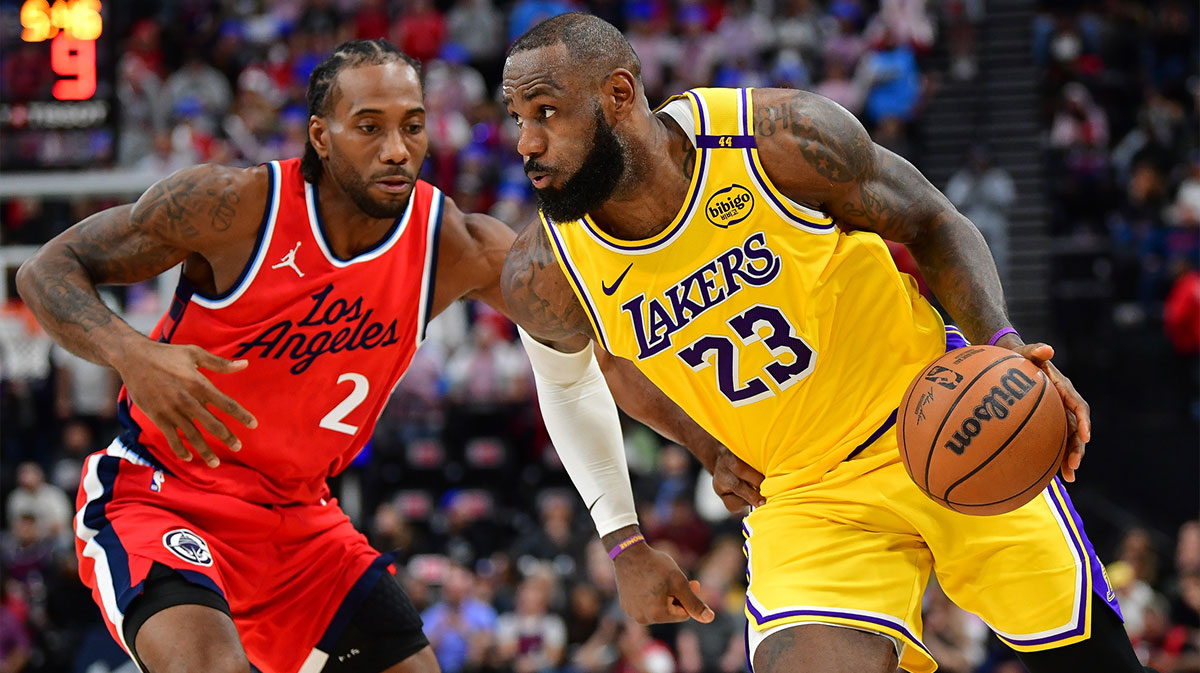  Los Angeles Lakers forward LeBron James (23) moves the ball against Los Angeles Clippers forward Kawhi Leonard (2) during the second half at Intuit Dome. 