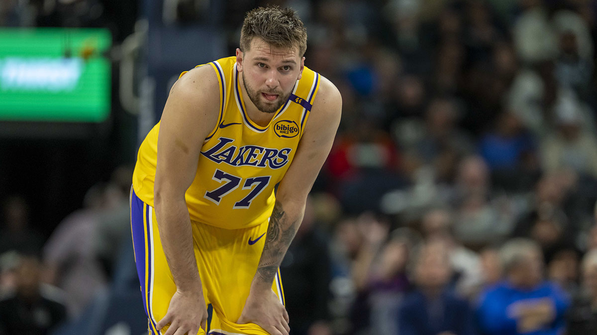 Los Angeles Lakers guard Luka Doncic (77) looks on against the Minnesota Timberwolves in the first half during game three of first round for the 2024 NBA Playoffs at Target Center.