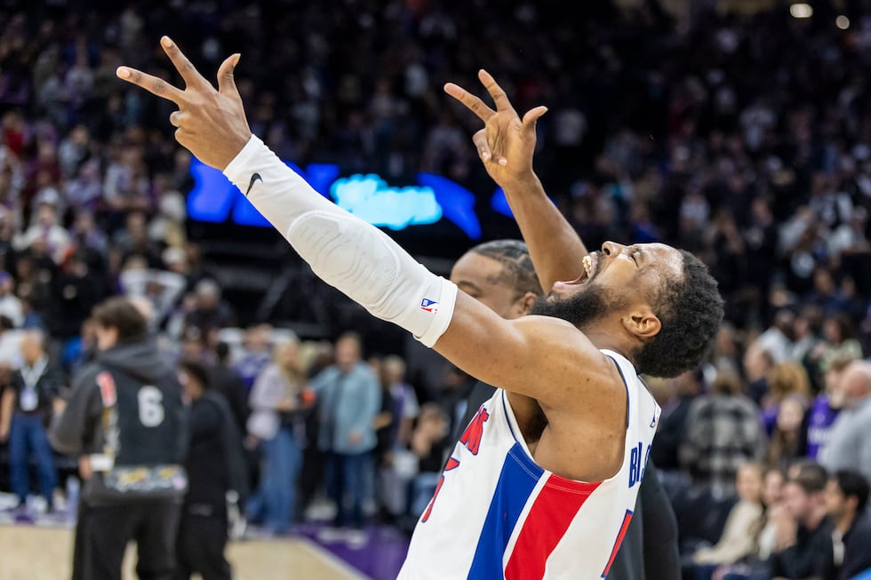 Detroit Pistons guard Malik Beasley celebrates at the end of an NBA basketball game against...