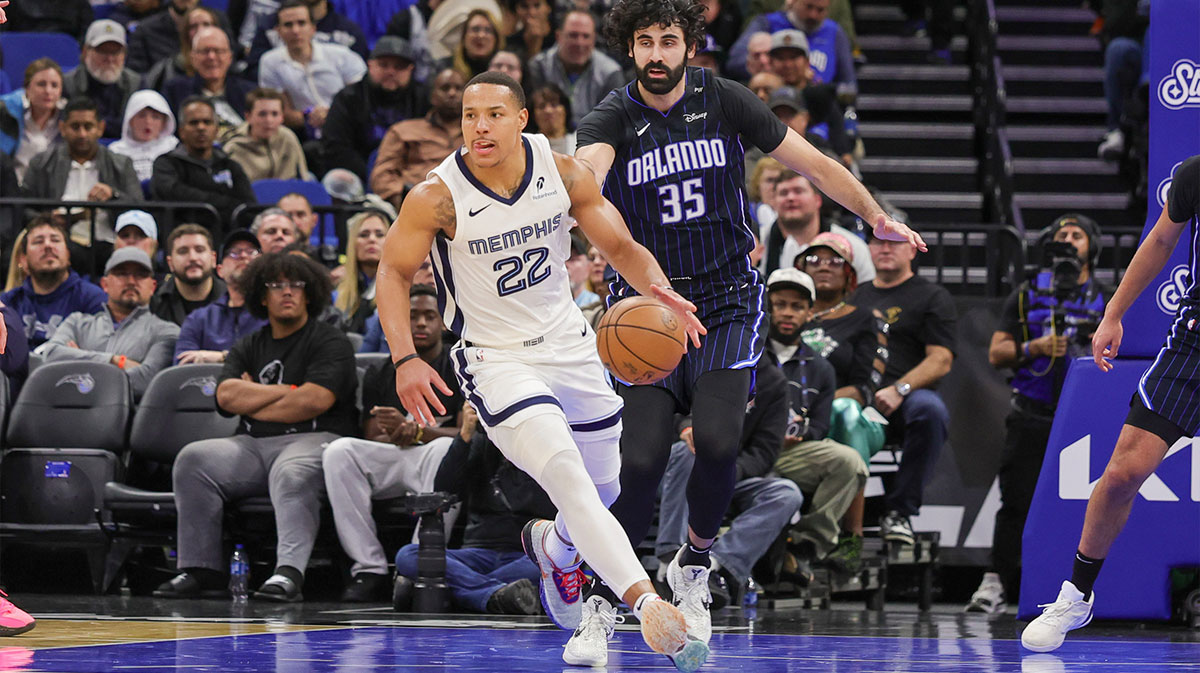 Memphis Grizzlies guard Desmond Bane (22) moves the ball in front of Orlando Magic center Goga Bitadze (35) during the second quarter at Kia Center. Mike Watters-Imagn Images