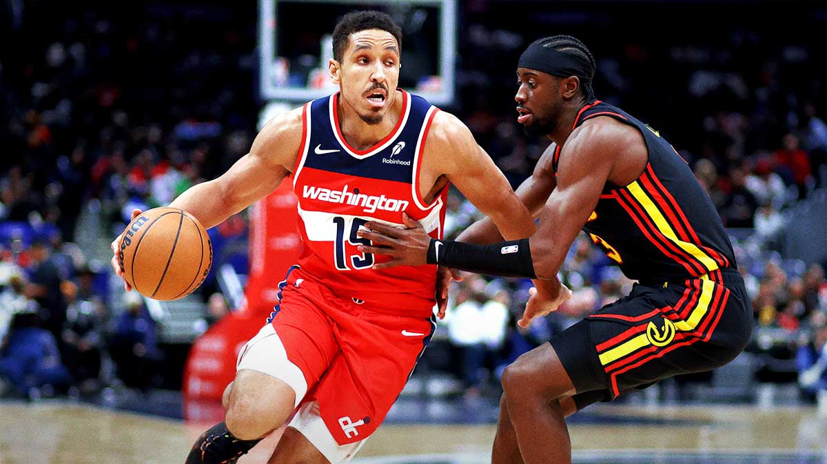 Washington Wizards guard Malcolm Brogdon (15) drives past Atlanta Hawks guard Caris LeVert (3) during the second half against at Capital One Arena. 
