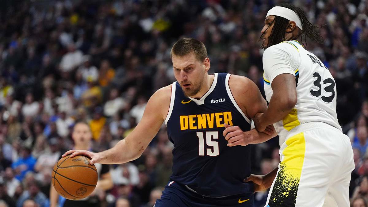 Indiana Pacers center Myles Turner (33) defends on Denver Nuggets center Nikola Jokic (15) in the second half at Ball Arena. 
