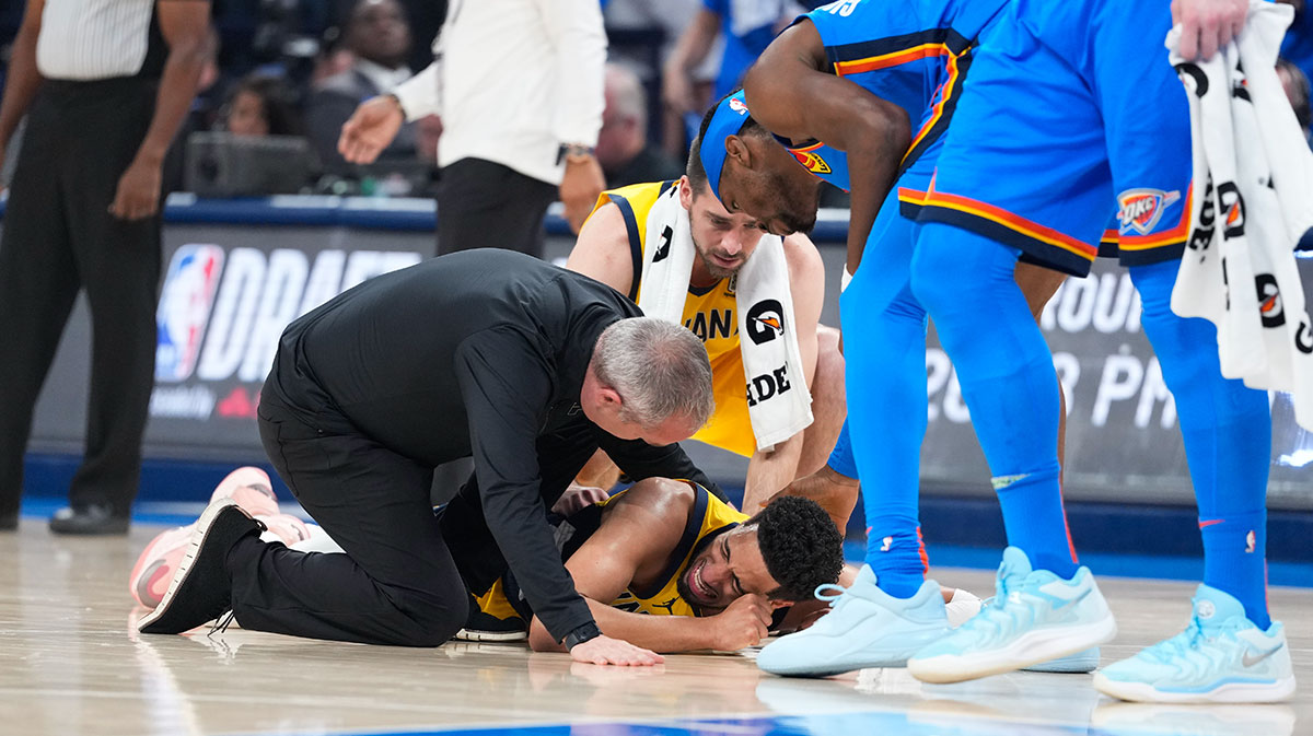 Jun 22, 2025; Oklahoma City, Oklahoma, USA; Indiana Pacers guard Tyrese Haliburton (0) reacts after suffering an injury during the first quarter against the Oklahoma City Thunder during game seven of the 2025 NBA Finals at Paycom Center. Mandatory Credit: Kyle Terada-Imagn Images