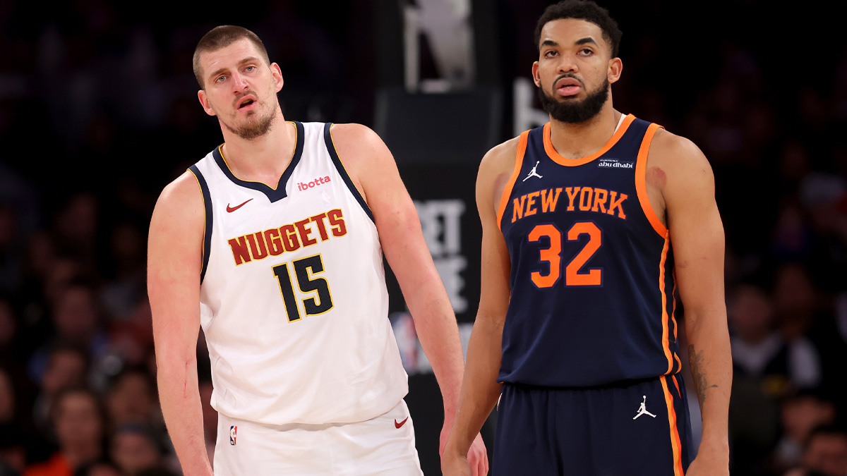 Denver Nuggets center Nikola Jokic (15) and New York Knicks center Karl-Anthony Towns (32) react during the fourth quarter at Madison Square Garden.