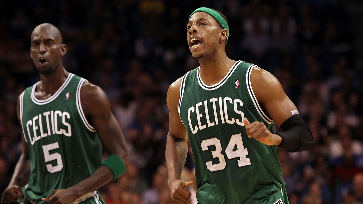Boston Celtics small forward Paul Pierce (34) and Boston Celtics power forward Kevin Garnett (5) react during the second half against the Orlando Magic at Amway Center. Boston Celtics defeated the Orlando Magic 91-83.