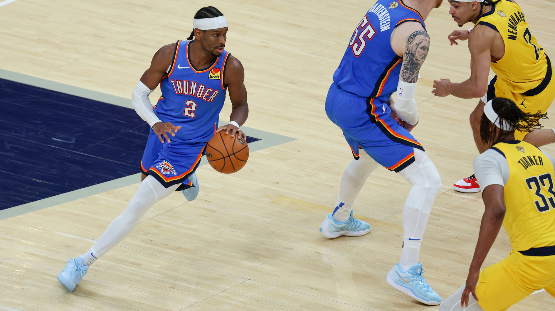 Oklahoma City Thunder guard Shai Gilgeous-Alexander (2) dribbles the ball against the Indiana Pacers in the third quarter during game six of the 2025 NBA Finals at Gainbridge Fieldhouse.
