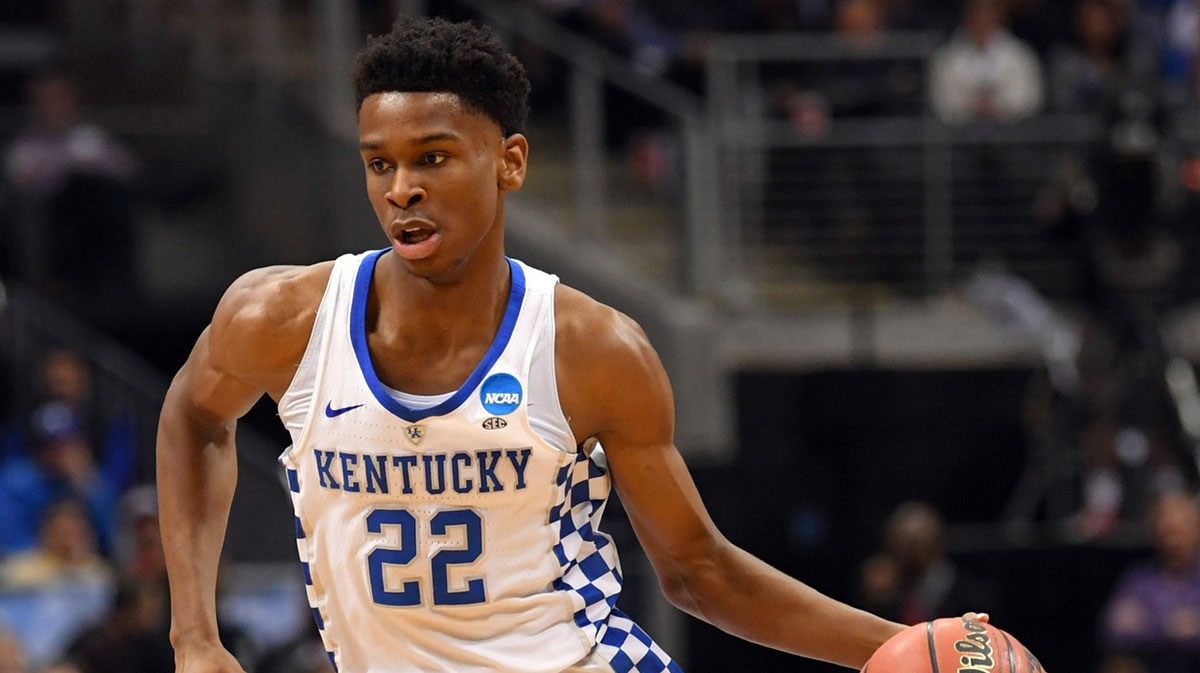 Kentucky Wildcats guard Shai Gilgeous-Alexander (22) controls the ball against the Kansas State Wildcats during the second half in the semifinals of the South regional of the 2018 NCAA Tournament at Philips Arena.