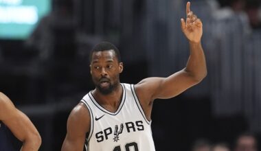 San Antonio Spurs forward Harrison Barnes gestures after hitting a 3-point shot against the Denver Nuggets in the first half of an NBA basketball game Wednesday, April 2, 2025, in Denver. (AP Photo/David Zalubowski)