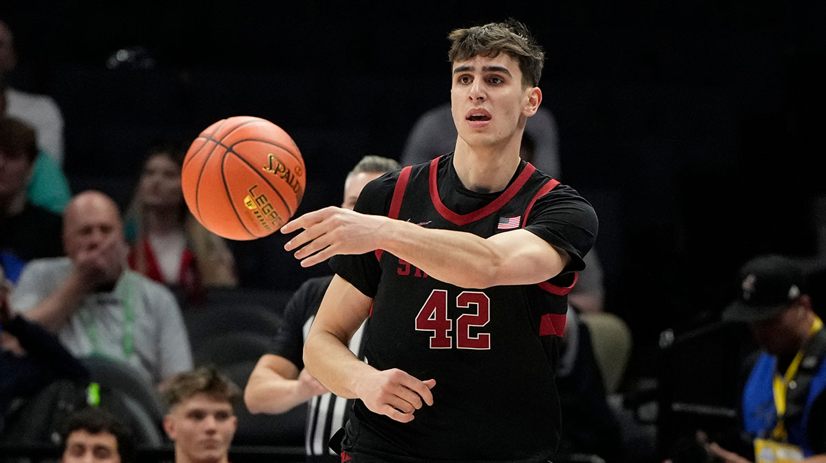 Stanford Cardinal forward Maxime Raynaud (42) passes the ball in the first half at Spectrum Center.