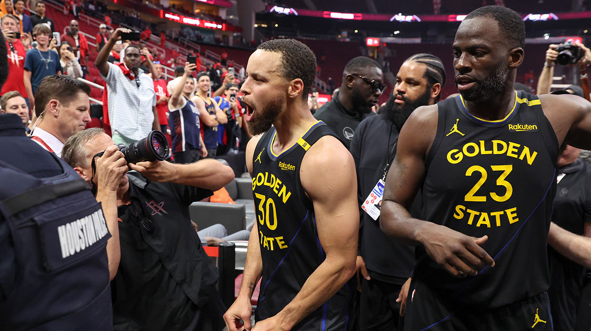 Golden State Warriors guard Stephen Curry (30) and forward Draymond Green (23) walk off the court after game seven of the first round for the 2025 NBA Playoffs against the Houston Rockets at Toyota Center.