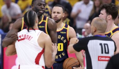 Golden State Warriors' Stephen Curry, center, watches Draymond Green scuffle with Houston Rockets' Dillon Brooks in the second quarter of an NBA Playoffs' First Round Game 4 at Chase Center in San Francisco on Monday, April 28, 2025.(Scott Strazzante/San Francisco Chronicle via AP)