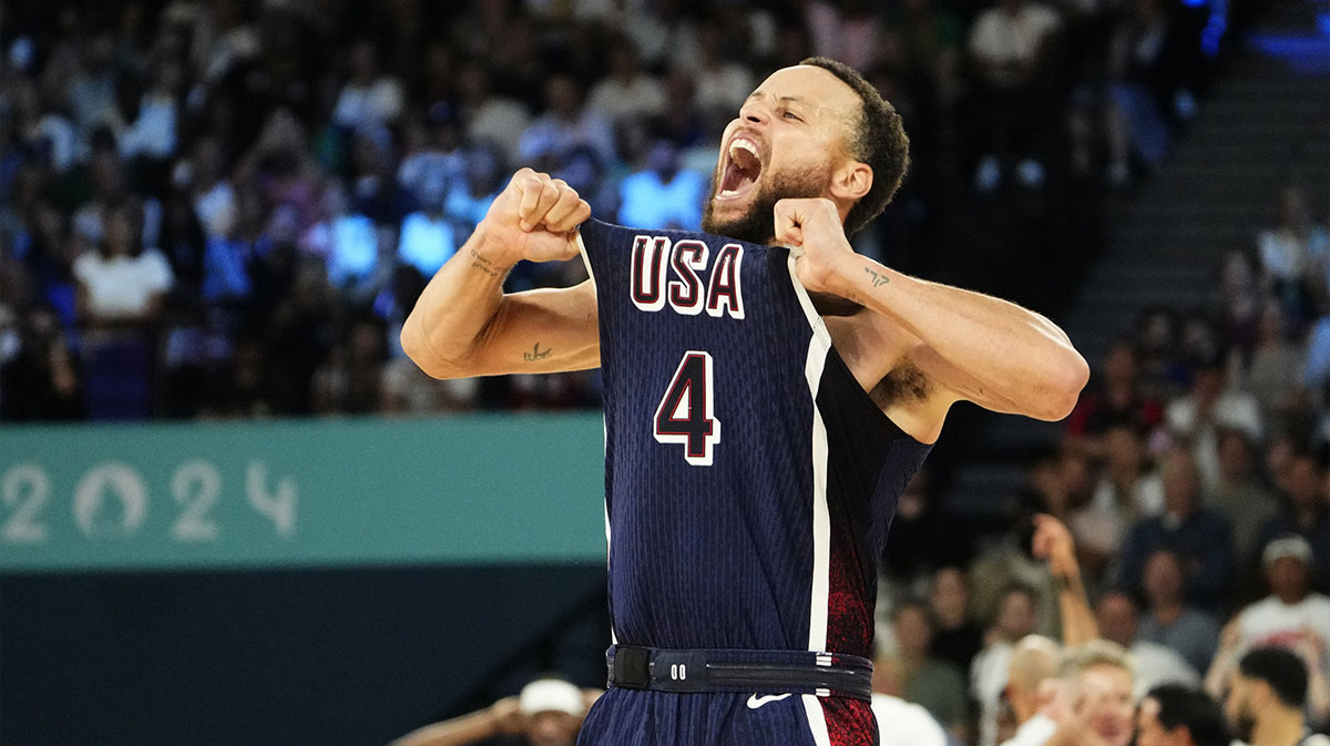 Team USA shooting guard Stephen Curry (4) celebrates in the second half against France in the men's basketball gold medal game during the Paris 2024 Olympic Summer Games at Accor Arena.