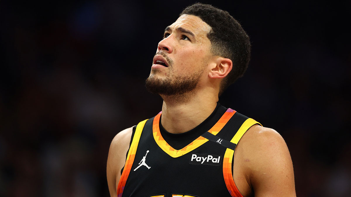 Phoenix Suns guard Devin Booker (1) reacts after a play against the Oklahoma City Thunder during the first half at Footprint Center.